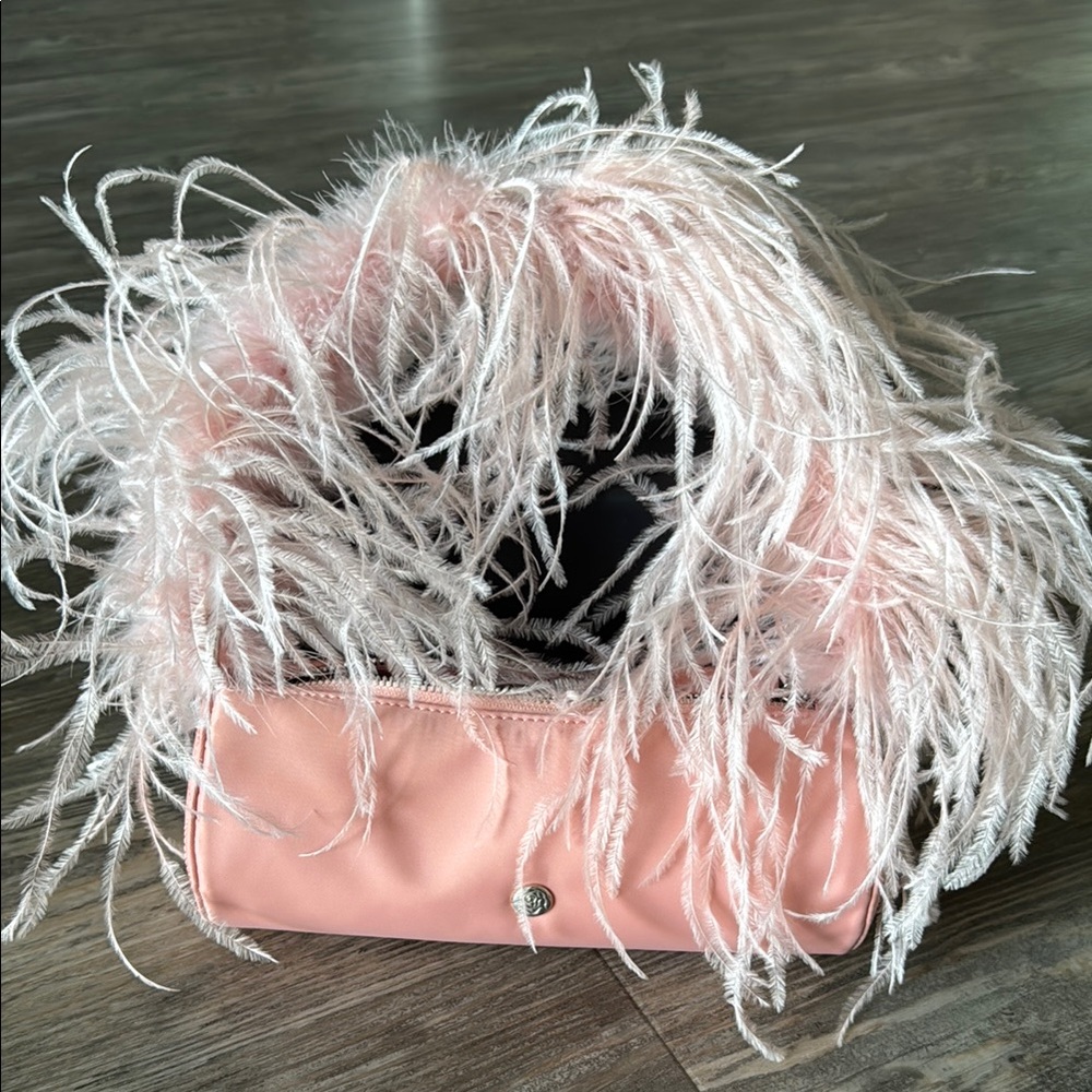 Elegant pink purse with natural ostrich fluffy strap